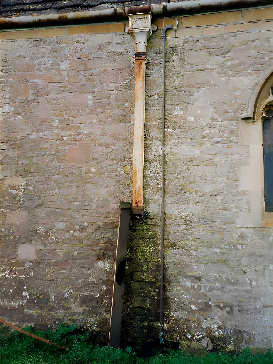 Downpipe decay - St. James West Littleton